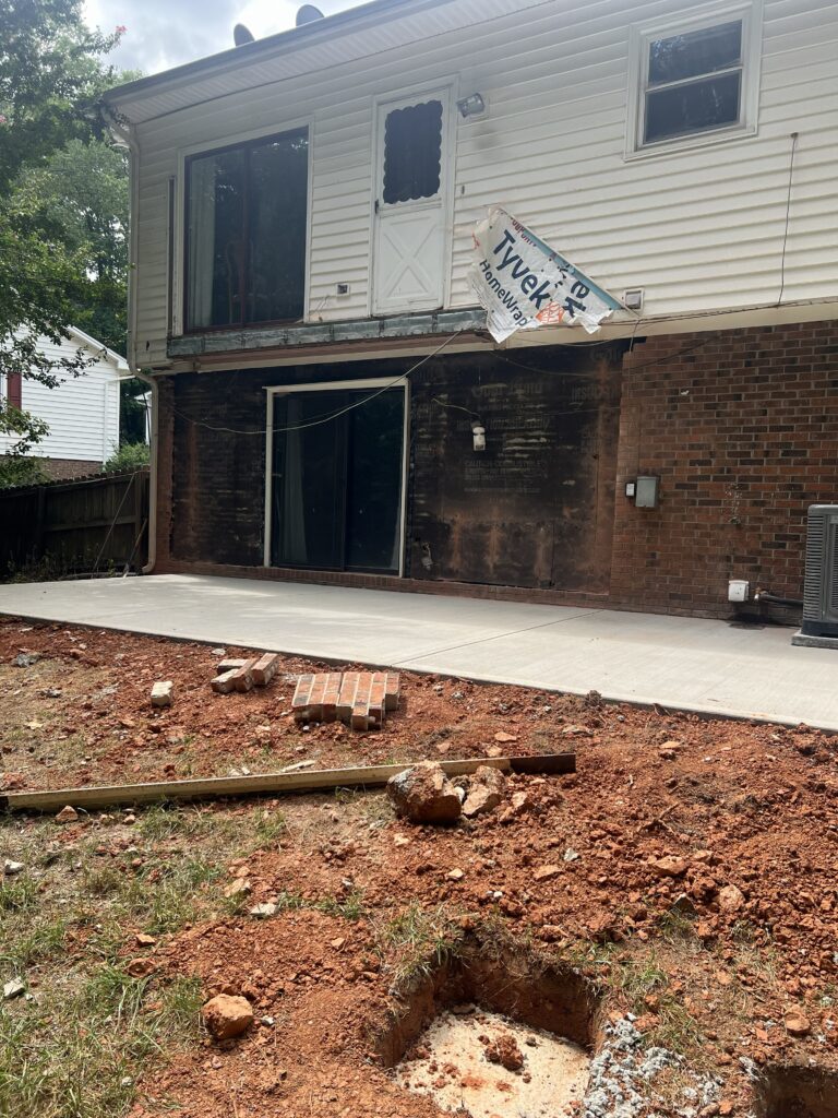 Back of Raleigh NC home before screened porch and deck addition by JCAR Builders