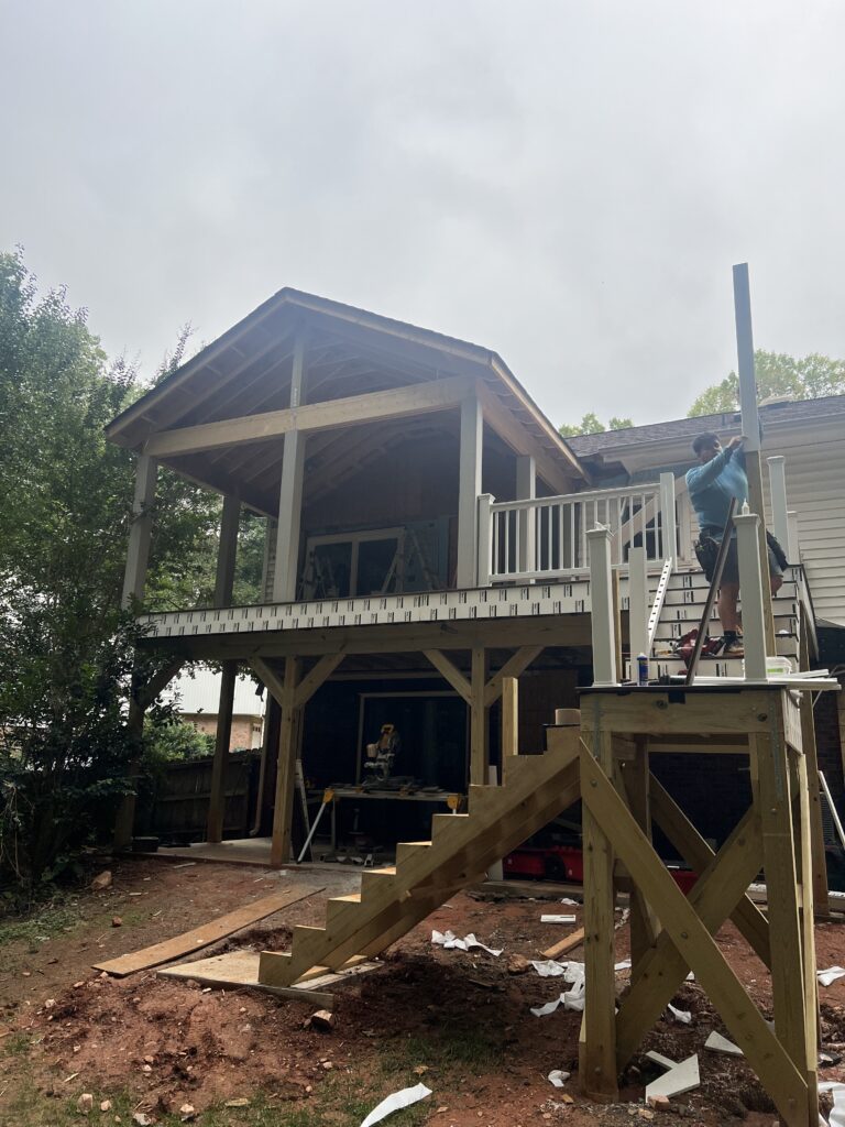 Deck and stair construction during Raleigh NC home addition project
